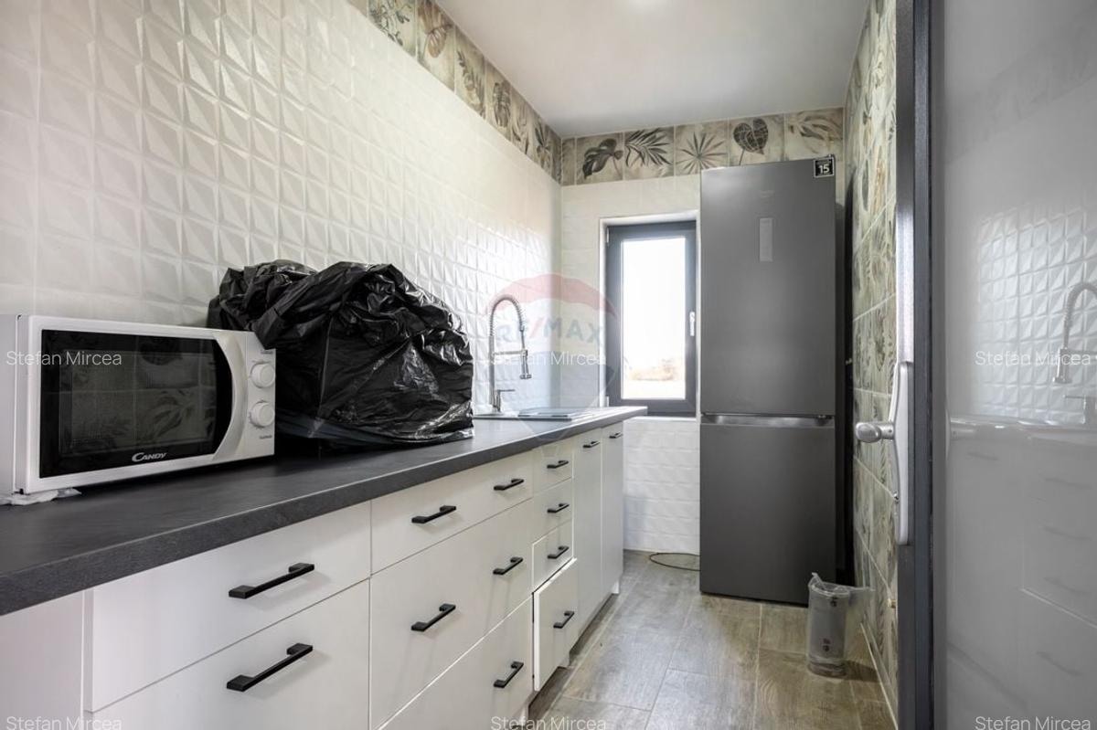 Casa noua in Stupini: 4 camere, 3 bai si teren generos de 600 mp - 10