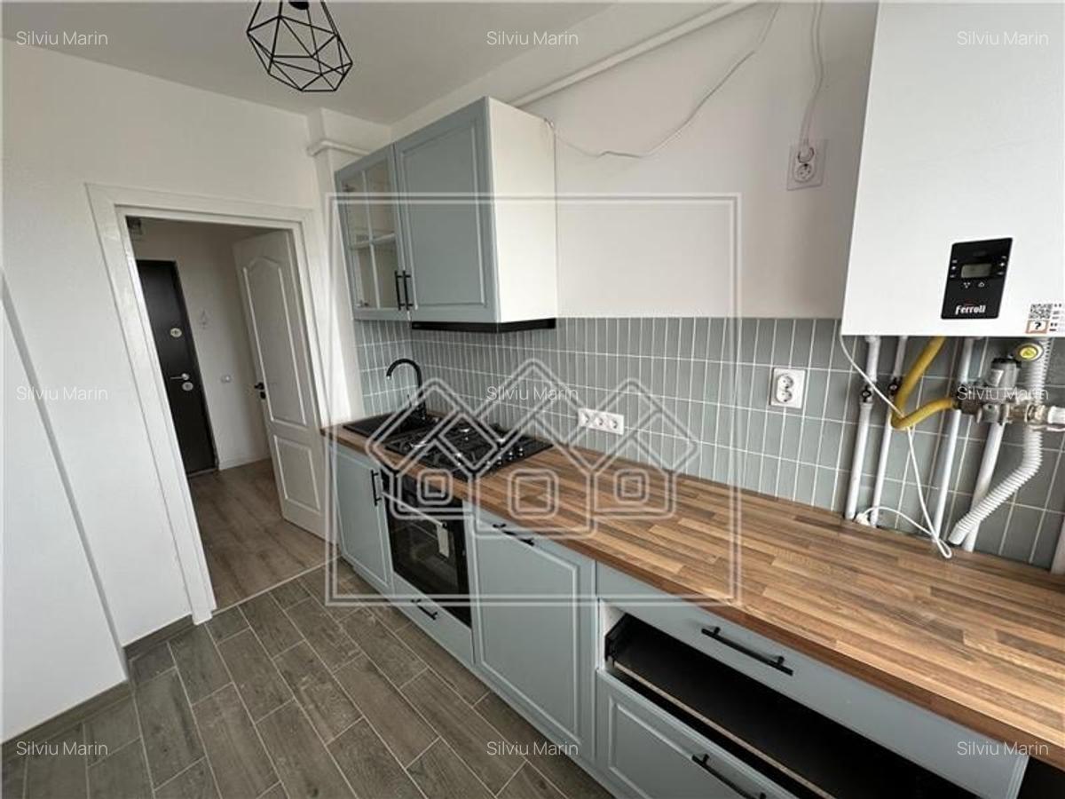 Apartament in Sibiu - 3 camere, decomandat, etaj intermediar - 13