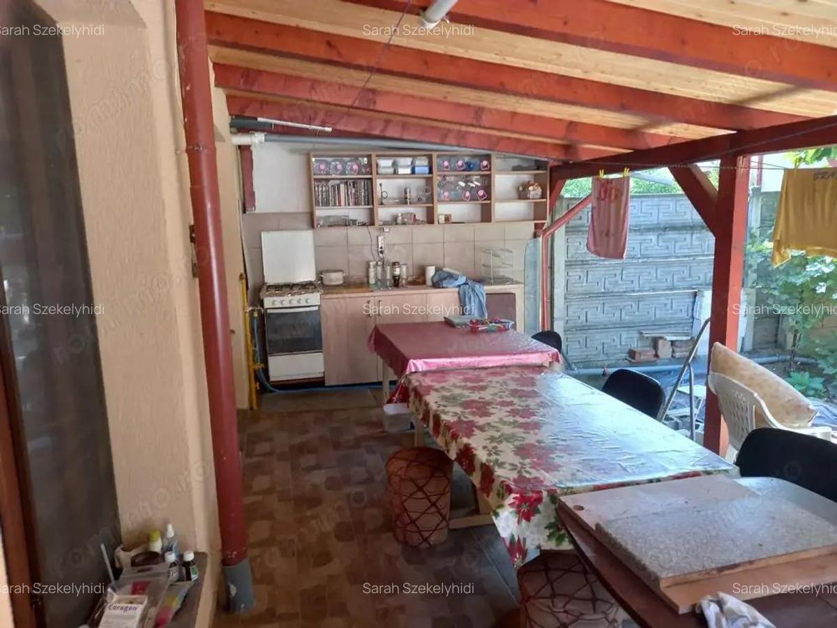 BRASADAS vinde casa in zona TITULESCU cu 5 camere si teren 350mp - 14