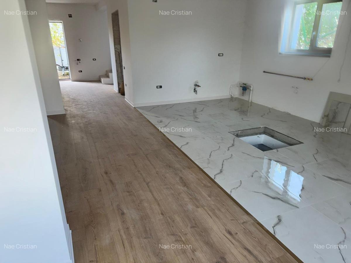 CASA MODERNA SI BINE CONSTRUITA CU CRAMA SI TEREN GENEROS - 7