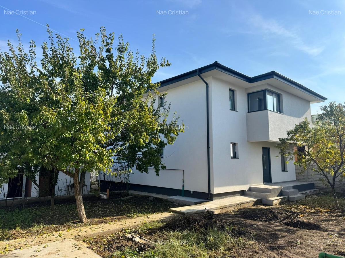 CASA MODERNA SI BINE CONSTRUITA CU CRAMA SI TEREN GENEROS - 1