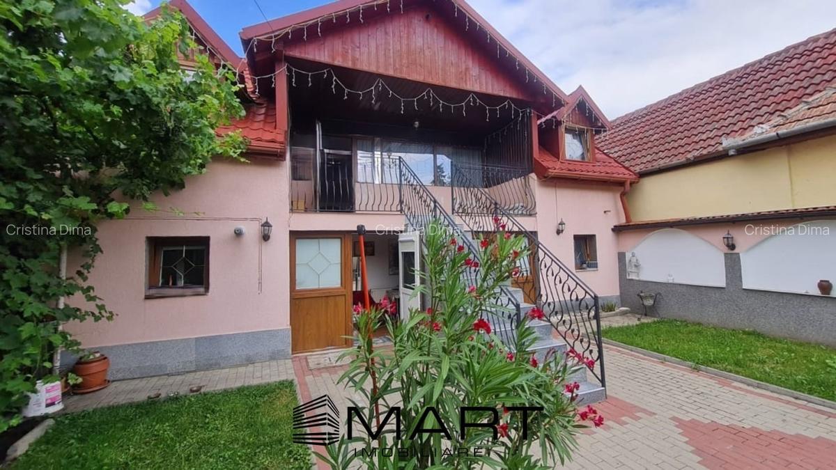 Casa formata din doua apartamente, cu curte de 450 mp, in zona Trei Stejari - 1