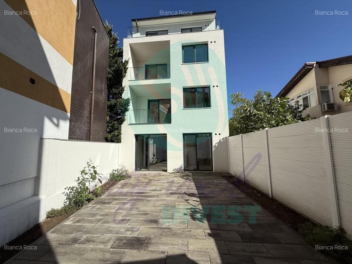 Apartament cu o curte generoasa de 60 mp - 1