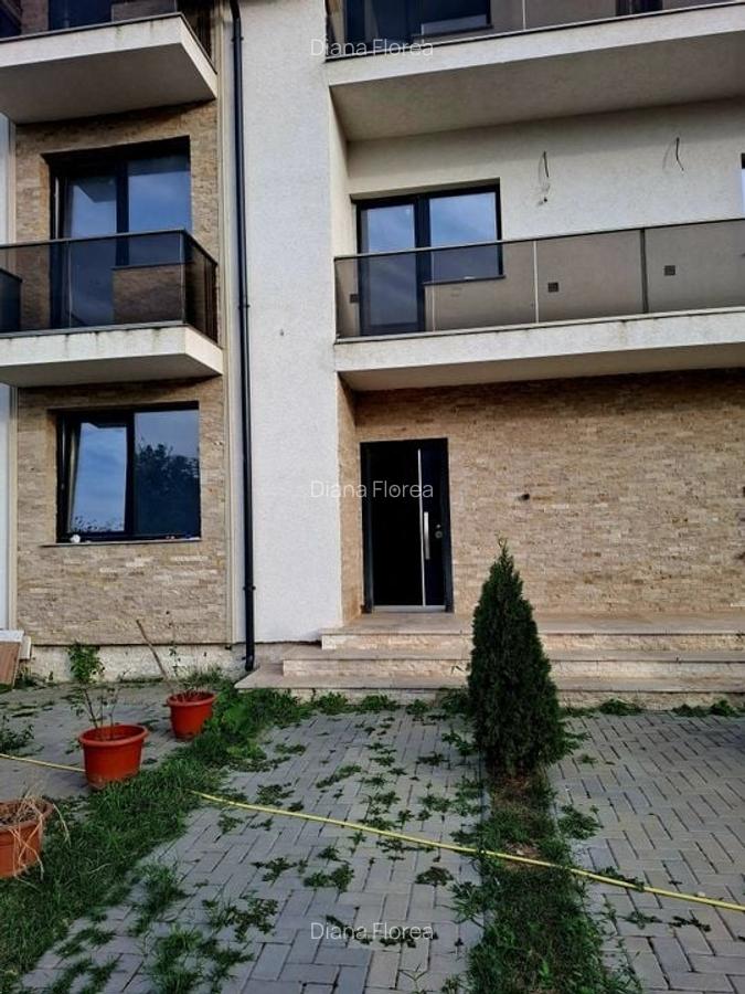 BUFTEA - APARTAMENT 3 CAMERE CU TRERASA SI CURTE. - 2