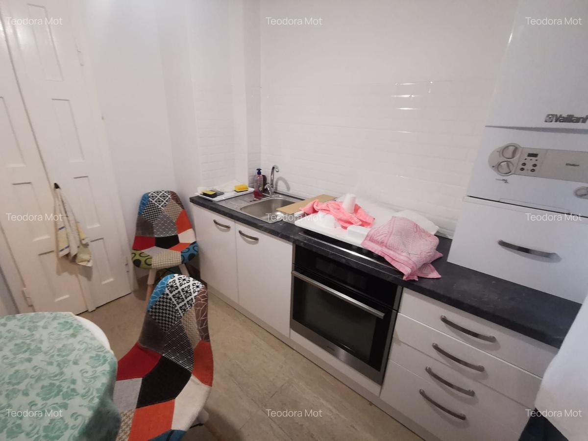 Apartament cu 3 camere semidecomandat, mobilat în Central - 14