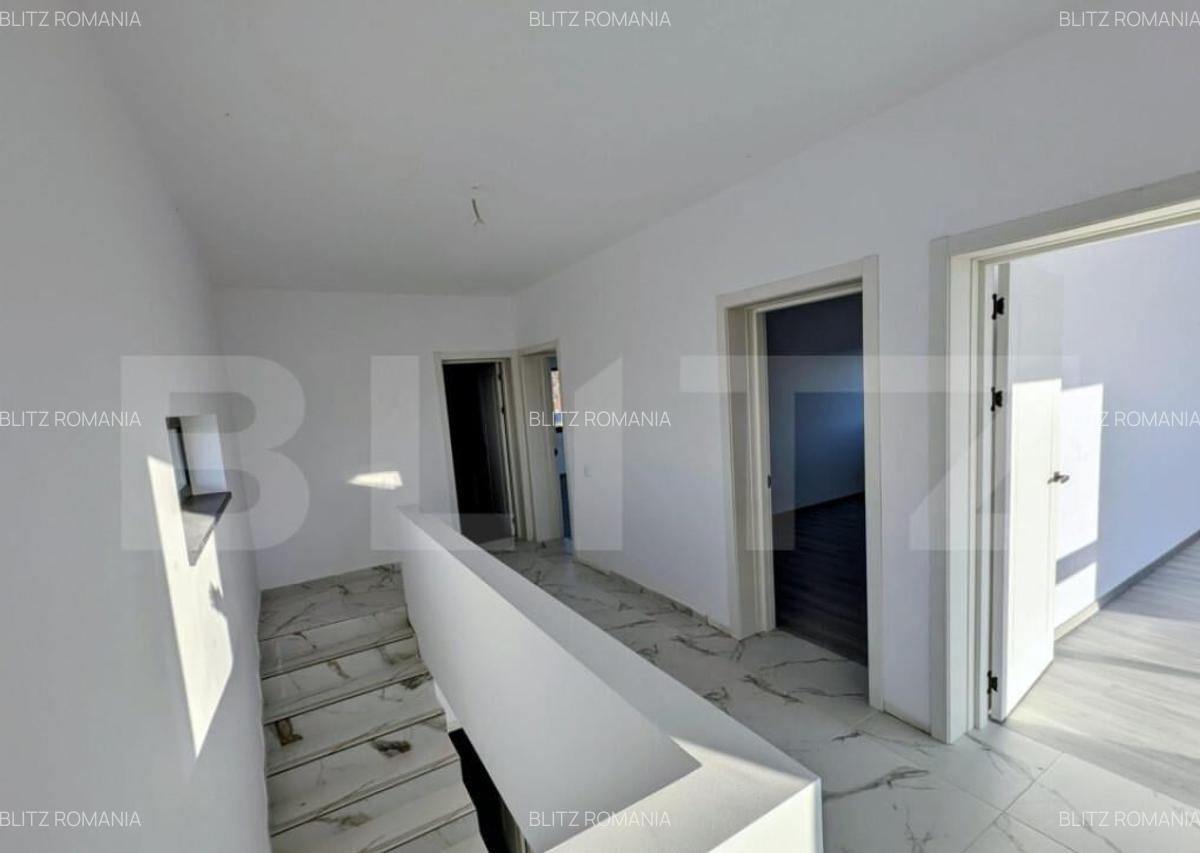 Casa moderna situata intr-o zona linistita, cu acces facil l - 18