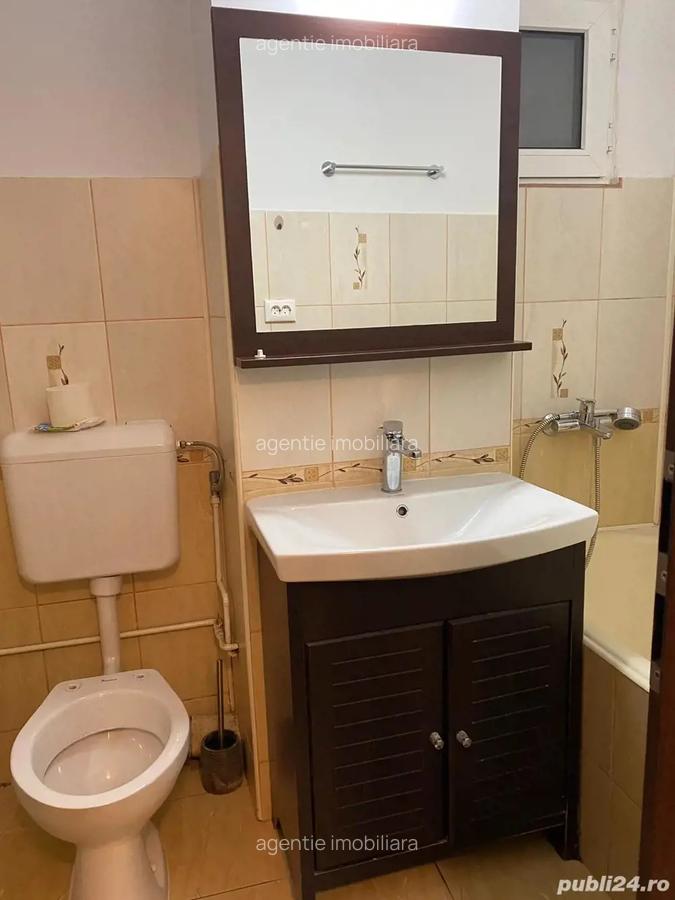 Decomandat, et 1 , centrala , zona Bogdanesti - 11