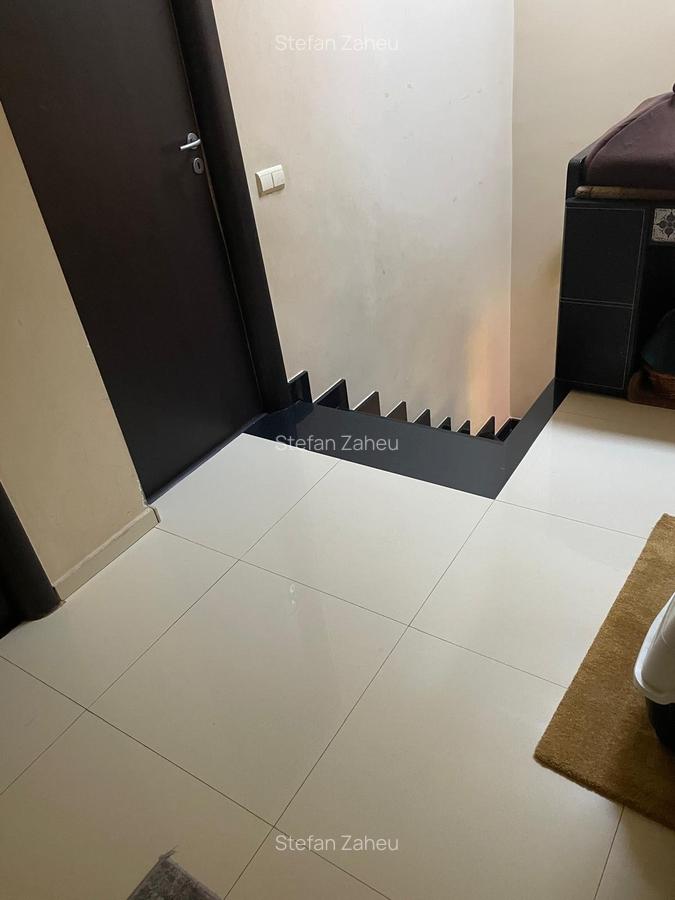 Locuință elegantă cu curte amenajată – parter + etaj, în spatele Pieței Delfinul - 14