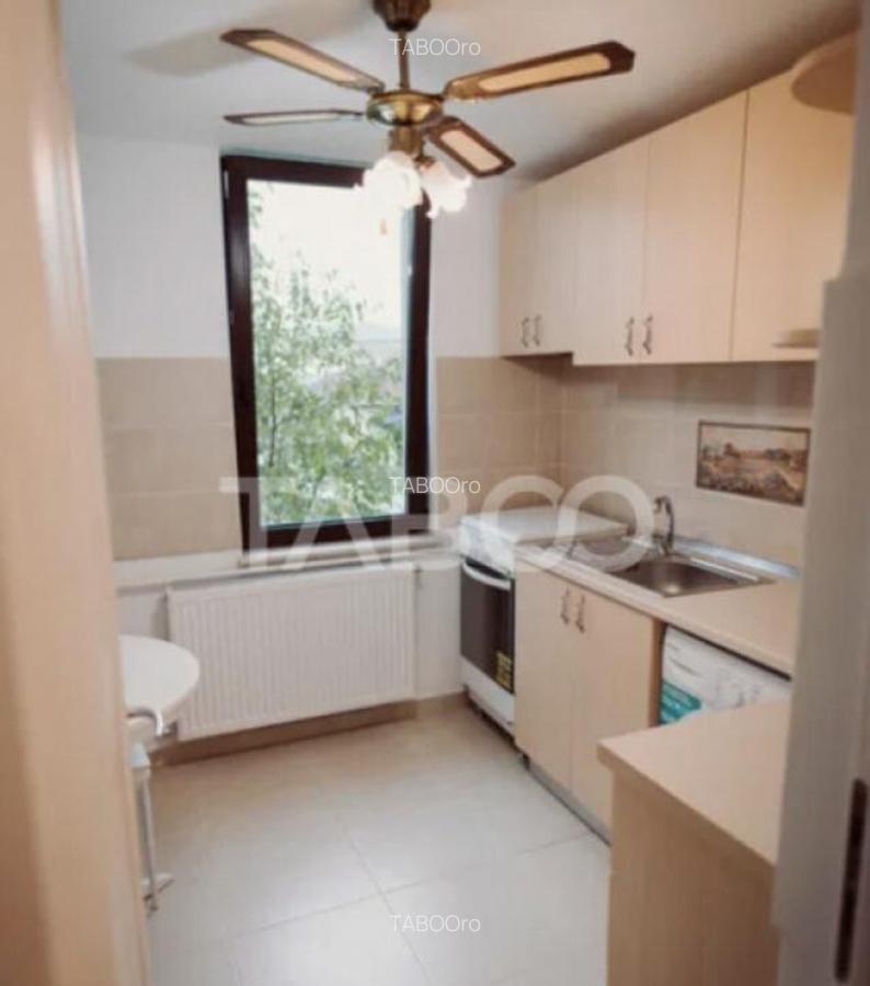 Apartament de vanzare decomandat cu 2 camere situat in Maras - 4
