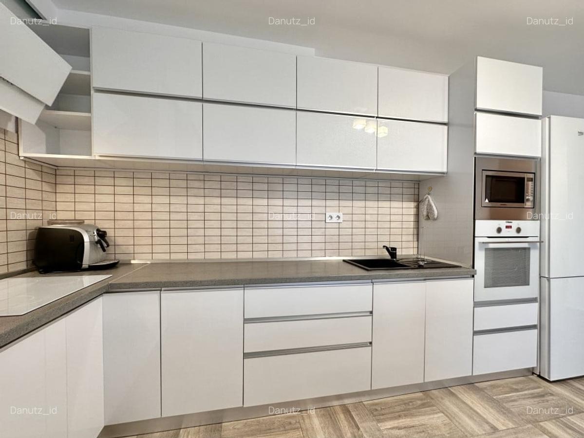 Inchiriere Apartament 3 camere, 2 bai, zona centrala, garaj - 12