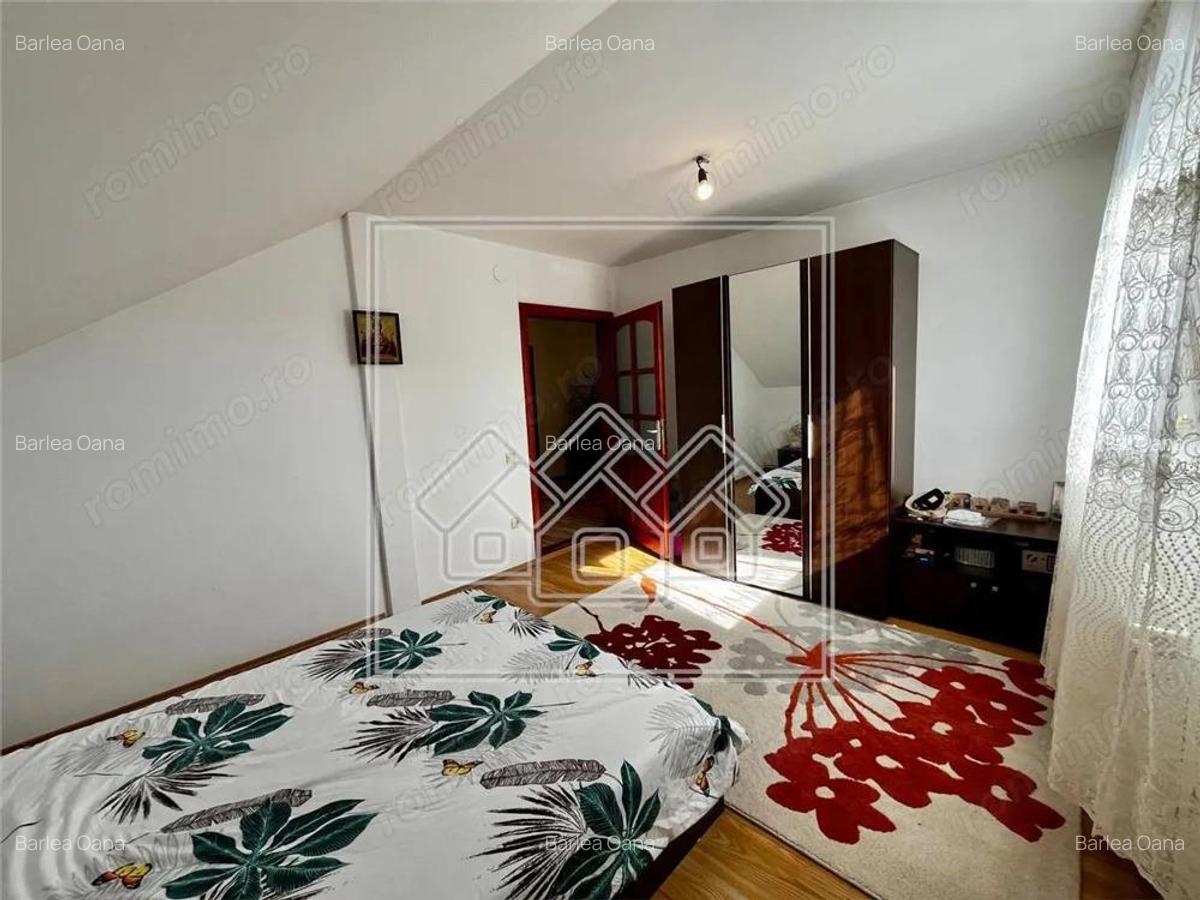 Casa individuala - teren 250 mp - pivnita si garaj - Selimbar - 16