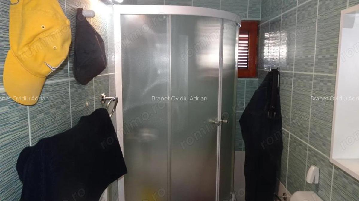 Vand casa in sistem P+M, are suprafa?a utila 160 mp,finisata integral ?i echipata complet. - 20