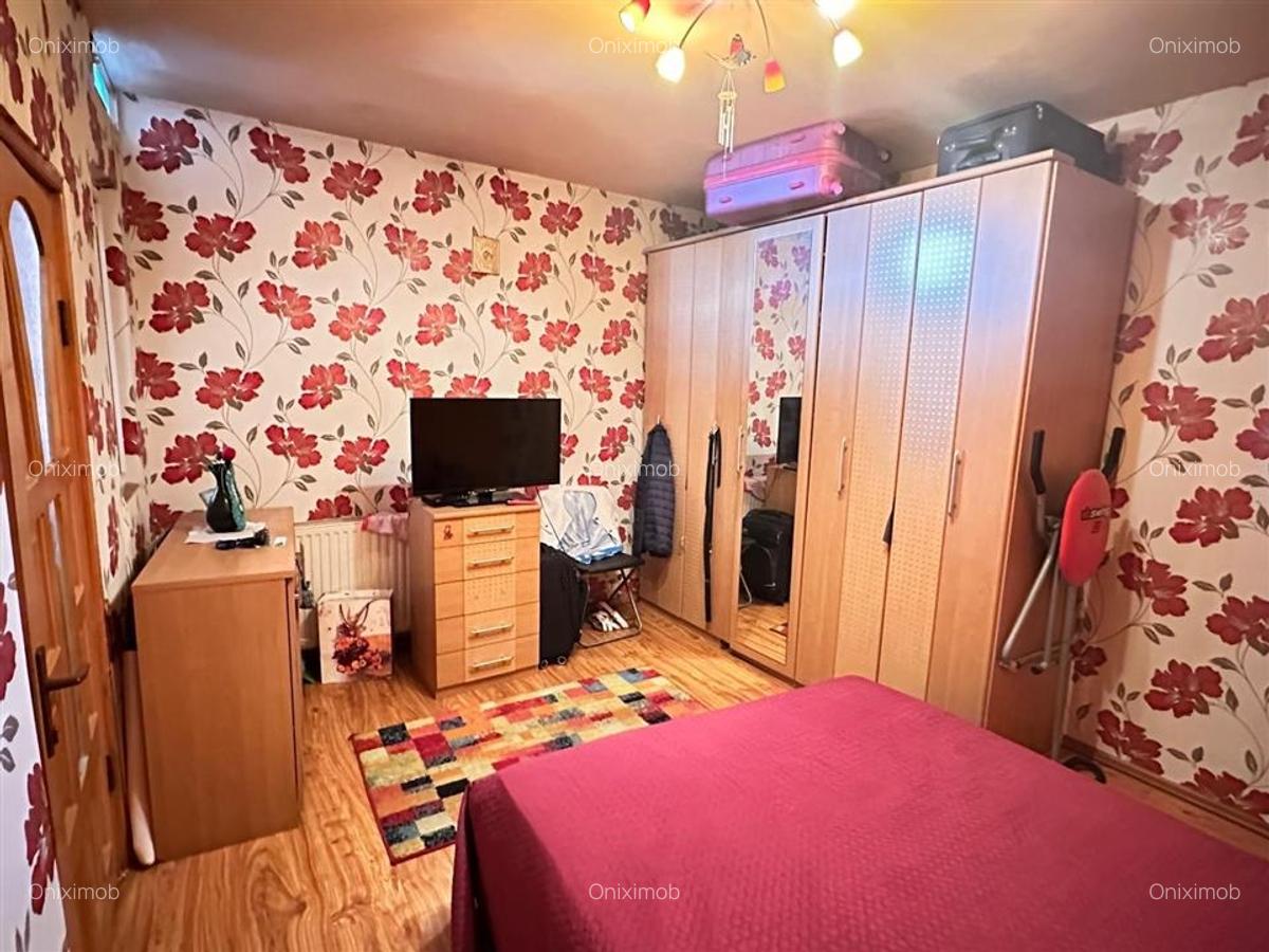 Casa batraneasca, zona  Buna Vestire  Ploiesti, teren 175 mp,renovata in 2004 - 4