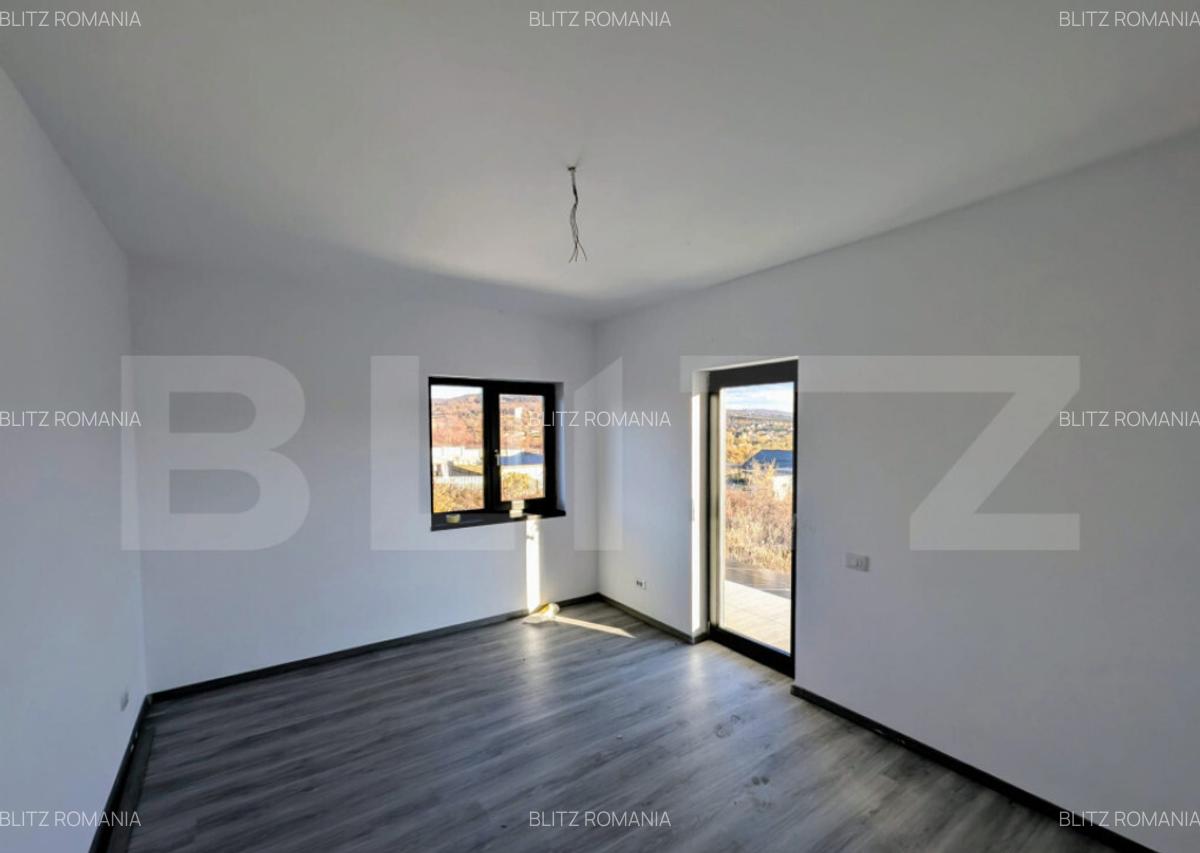 Casa moderna situata intr-o zona linistita, cu acces facil l - 10