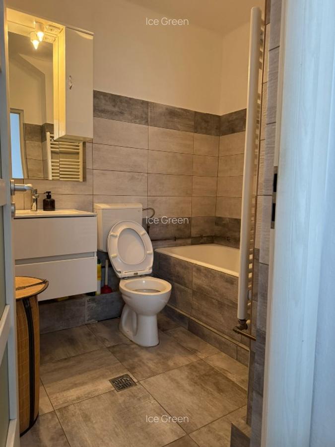 Închiriez apartament 2 camere decomandat 56 mp etaj 5 în mijlocul capitalei - 8