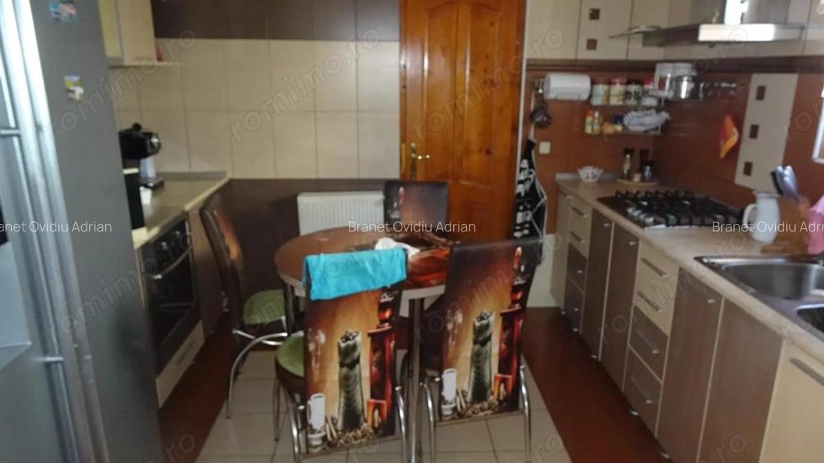 Vand casa in sistem P+M, are suprafa?a utila 160 mp,finisata integral ?i echipata complet. - 18