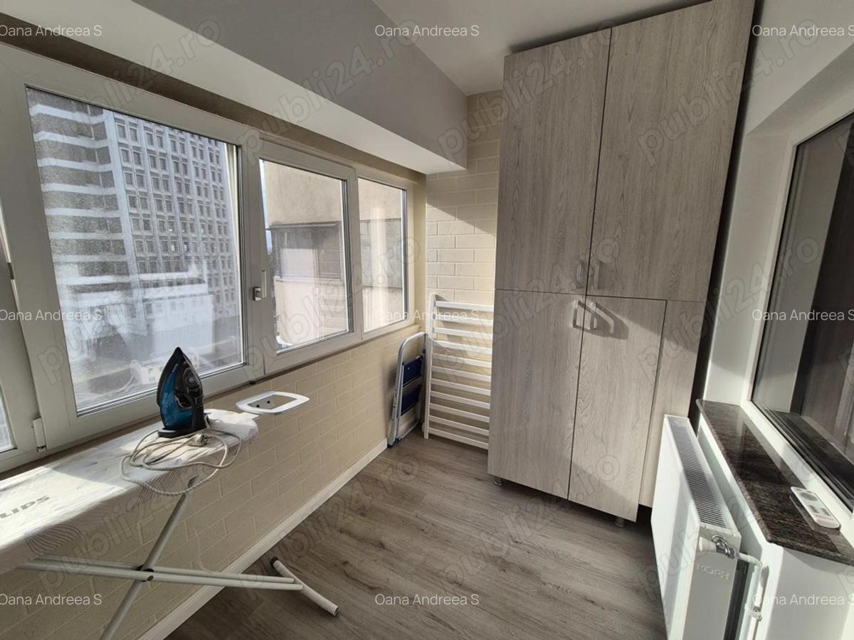 Inchiriez apartament 2 camere decom., zona ultracentrala intermediar - 9 Inchiriez apartament 2 camere decom., zona ultracentrala intermediar - 9