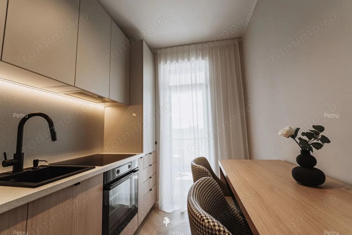 Garsoniera de lux, decomandata, 31mp utili, balcon, parcare, bloc cu lift - 1