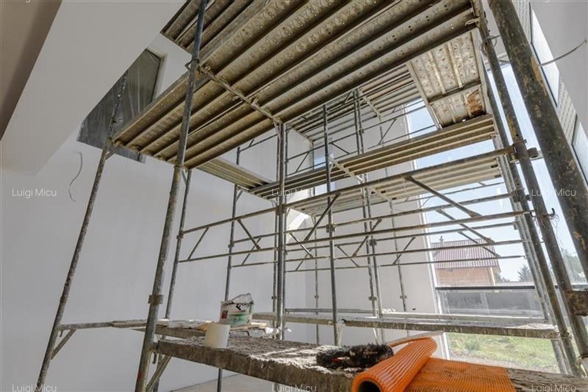 Casa noua in Harman, cu arhitectura moderna si spatii vitrate - 14