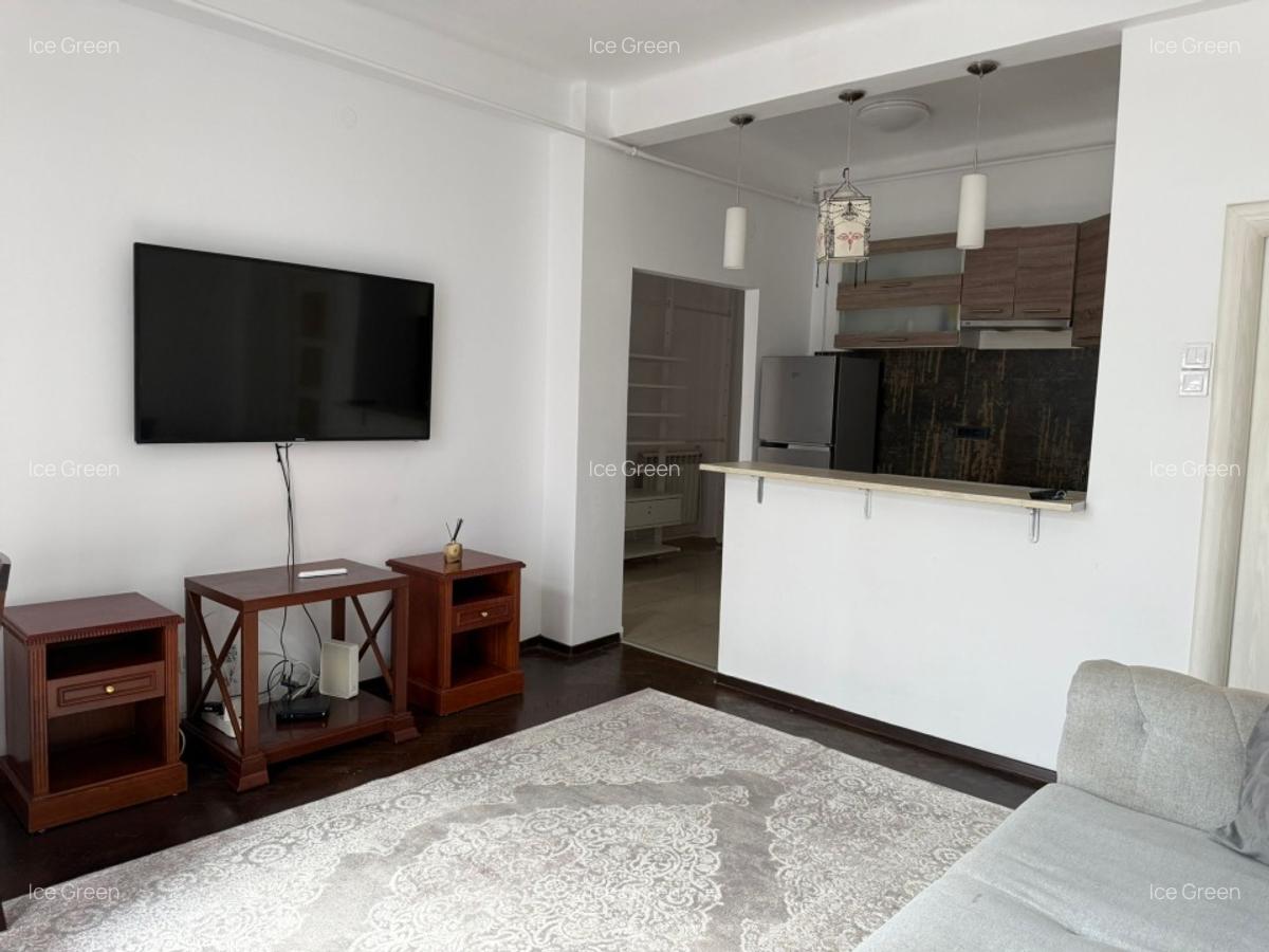 Închiriez apartament 2 camere decomandat 56 mp etaj 5 în mijlocul capitalei - 6