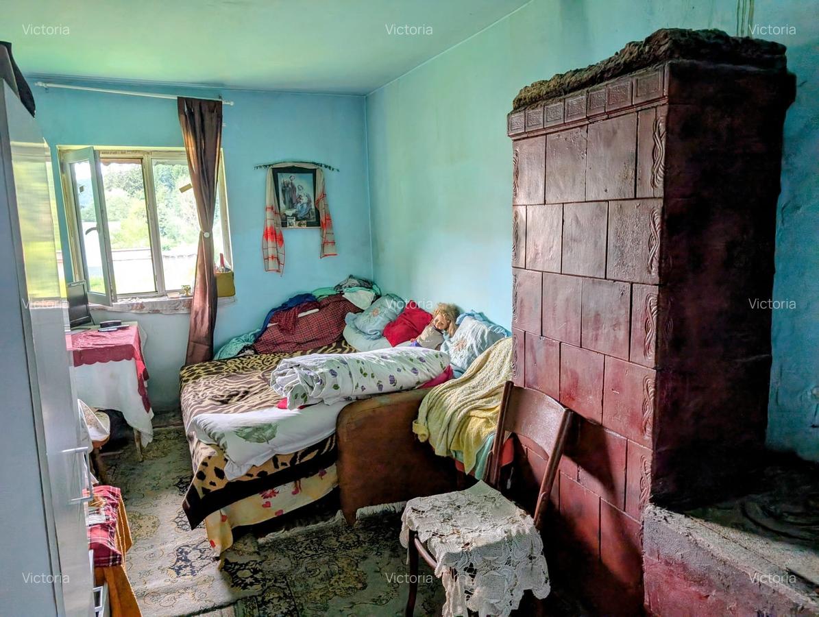 Predeal,P+1,casa din busteni,in spatele terenului-raul Prahova,posibil extindere - 15