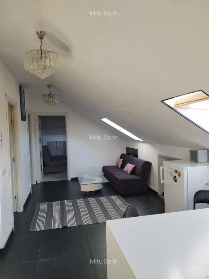 Apart 3 camere la mansarda(2 dormitoare + 1 living cu bucatarie) str. M. Eliade - 5