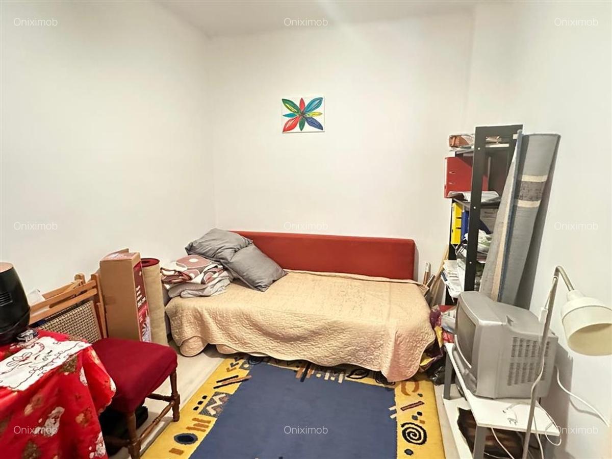 Casa batraneasca, zona  Buna Vestire  Ploiesti, teren 175 mp,renovata in 2004 - 11