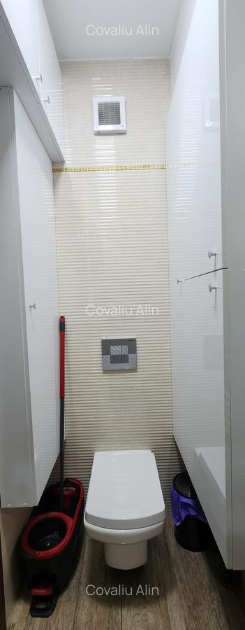 Apartament 2 camere, 2 grupuri sanitare, loc parcare, situat in Tractorul - 12