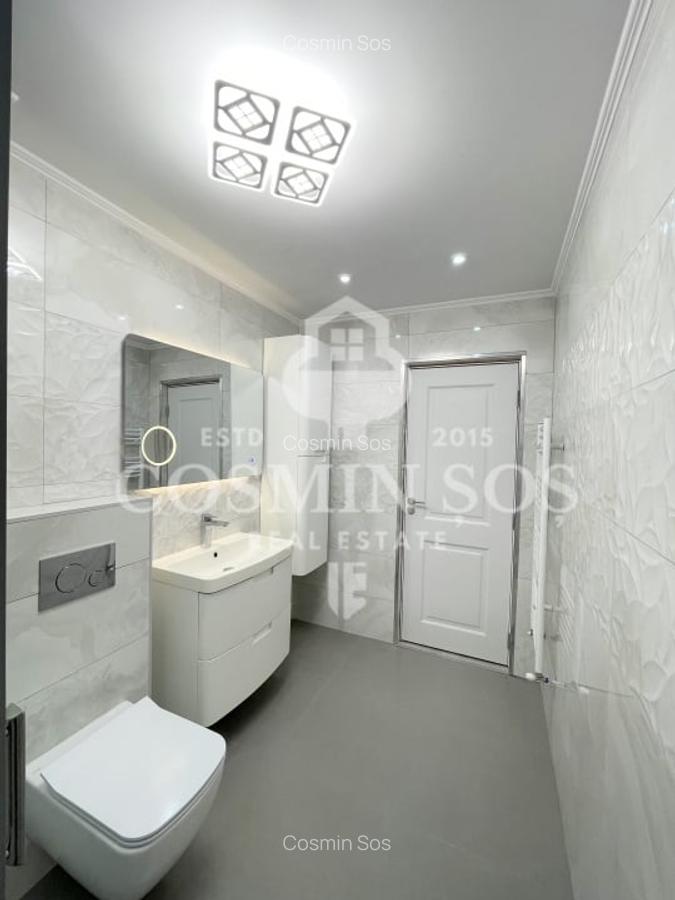 Apartament cu 3 camere de vanzare, cu gradina si parcare, Floresti - 11