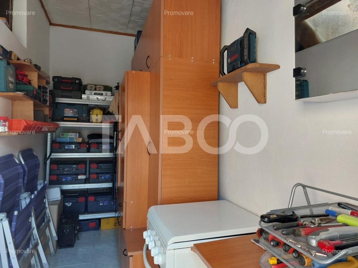 Casa 109 mp 4 camere pivnita terasa loc parcare curte comuna Cisnadie - 24