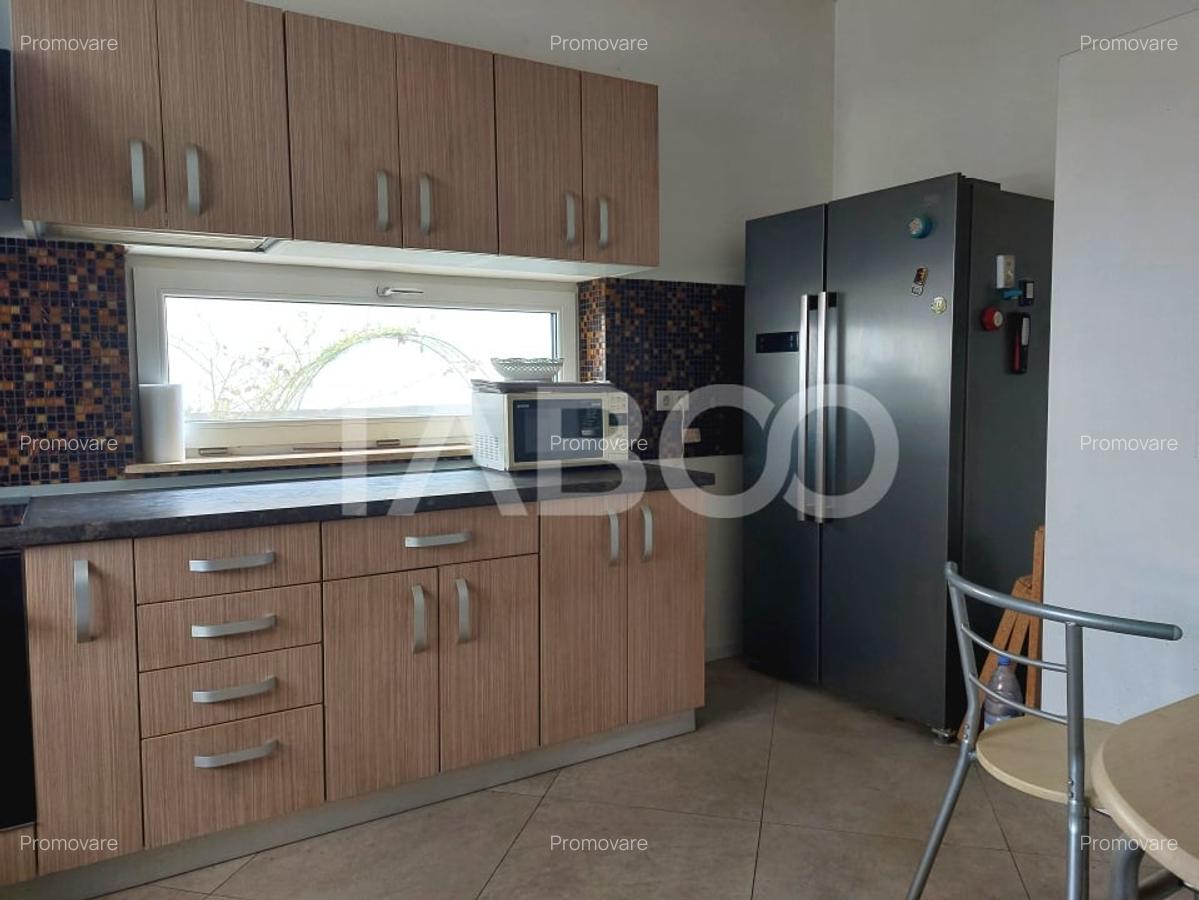 Casa individuala 4 camere P+1E 118 mp 322 mp parcela teren Cisnadie - 2