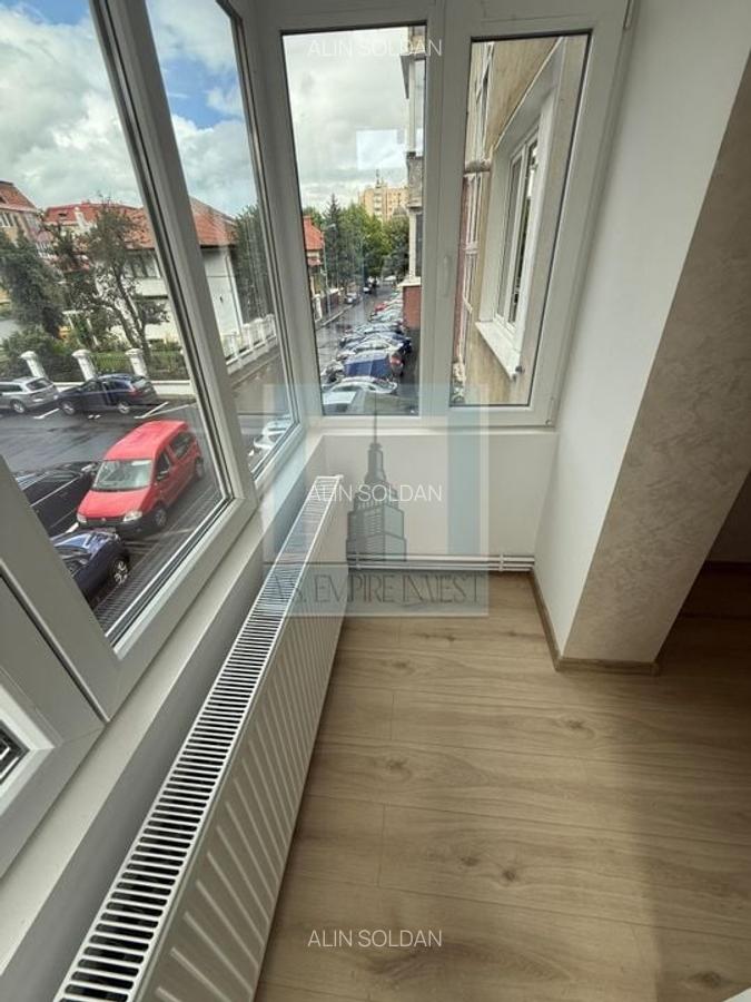 Apartament 4 camere renovat complet, etj. 1/4 - zona Tractorul - 12