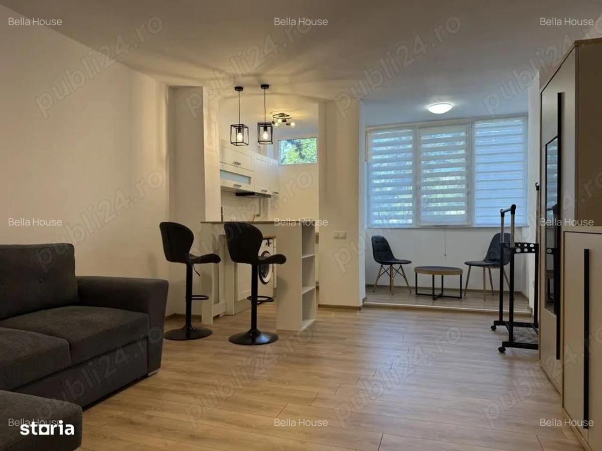 Garsoniera titan in apropiere de mijloacele de transport - 3