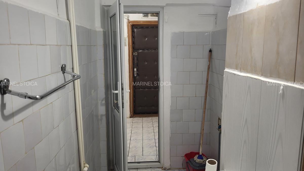 De inchiriat apartament 2 camere, situat etaj 1 in bloc mic, zona Hotel Vrancea. - 13