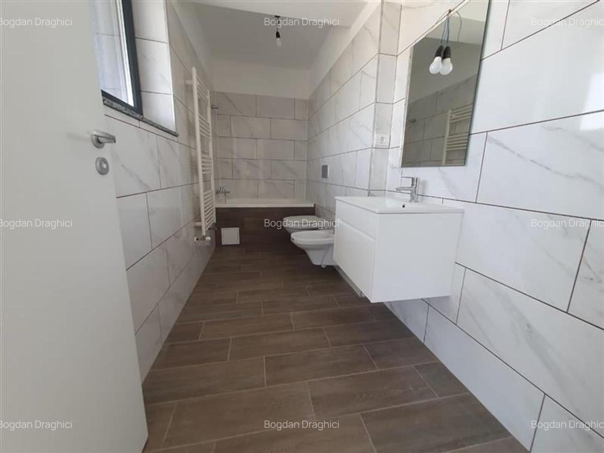 Apartament cu 3 camere decomandat în Tractorul - 6