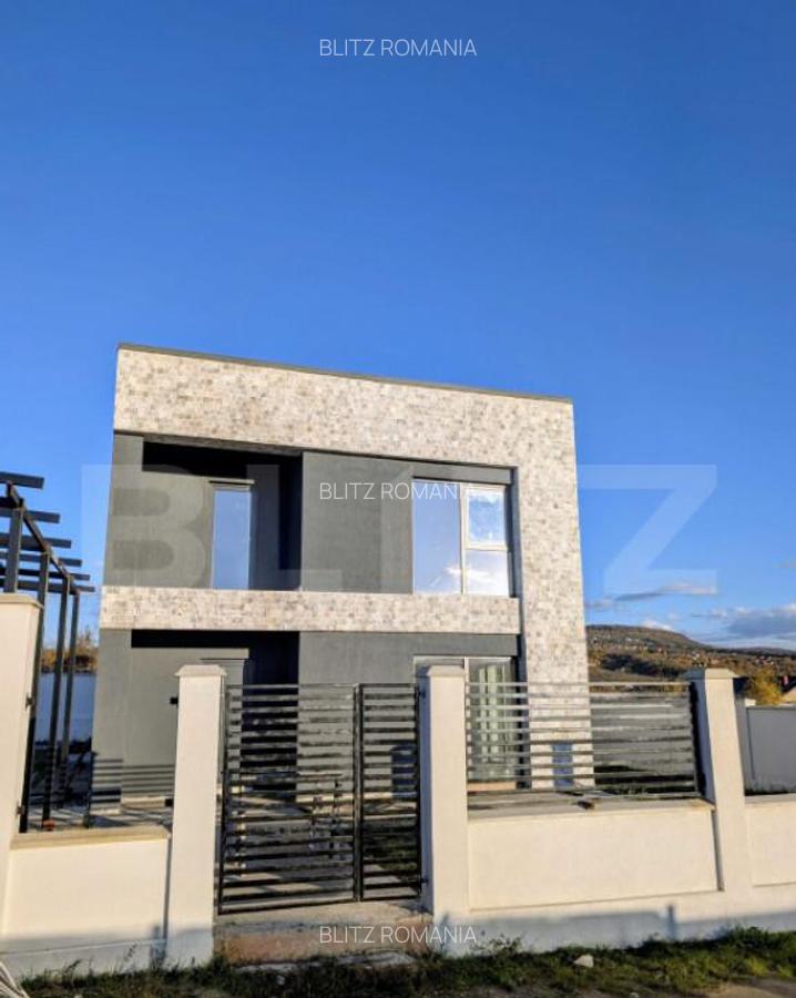 Casa moderna situata intr-o zona linistita, cu acces facil l - 11