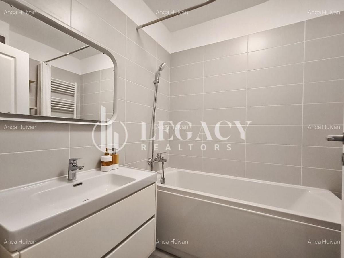 Locuință cochetă la mansardă, cu balcon și boxă de depozitare - 12