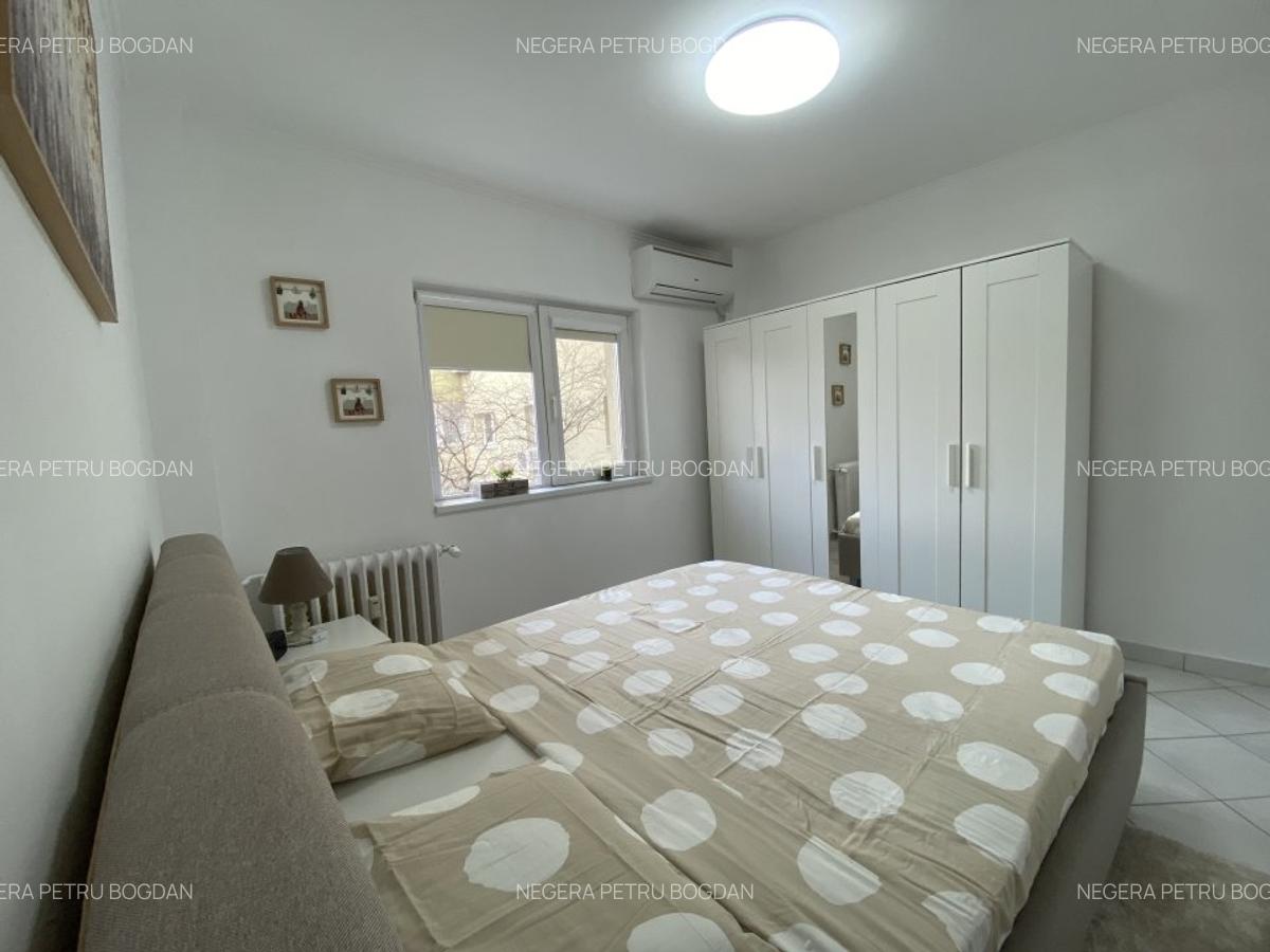 Romana,renovat nou,curat,cu spatii de depozitare. - 4