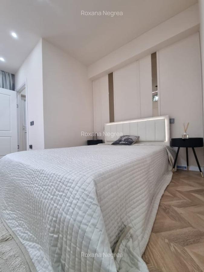Apartament  cu 2 camere, ultrafinisat, zona semicentrala, etaj intermediar - 9