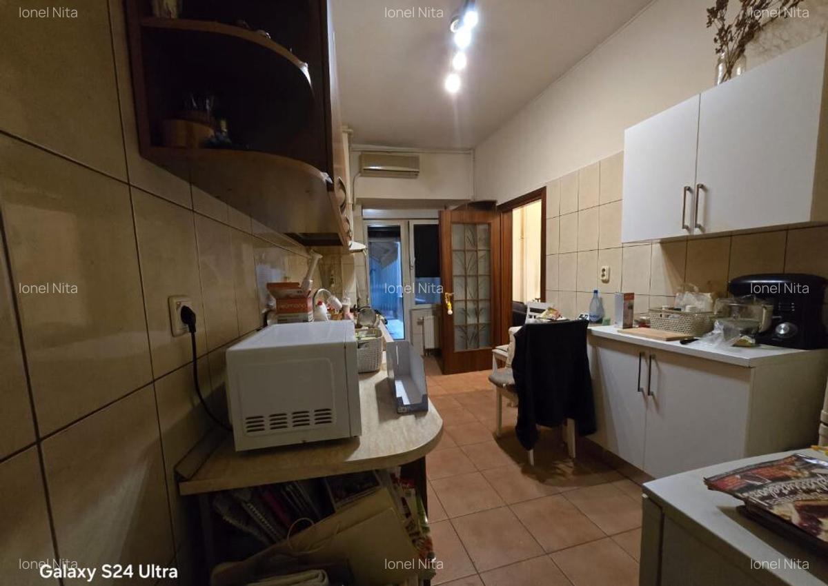 P-ta Victoriei,ap.3 cam,an 1997,dec,suprf.128mp,loc parcare subteran - 11