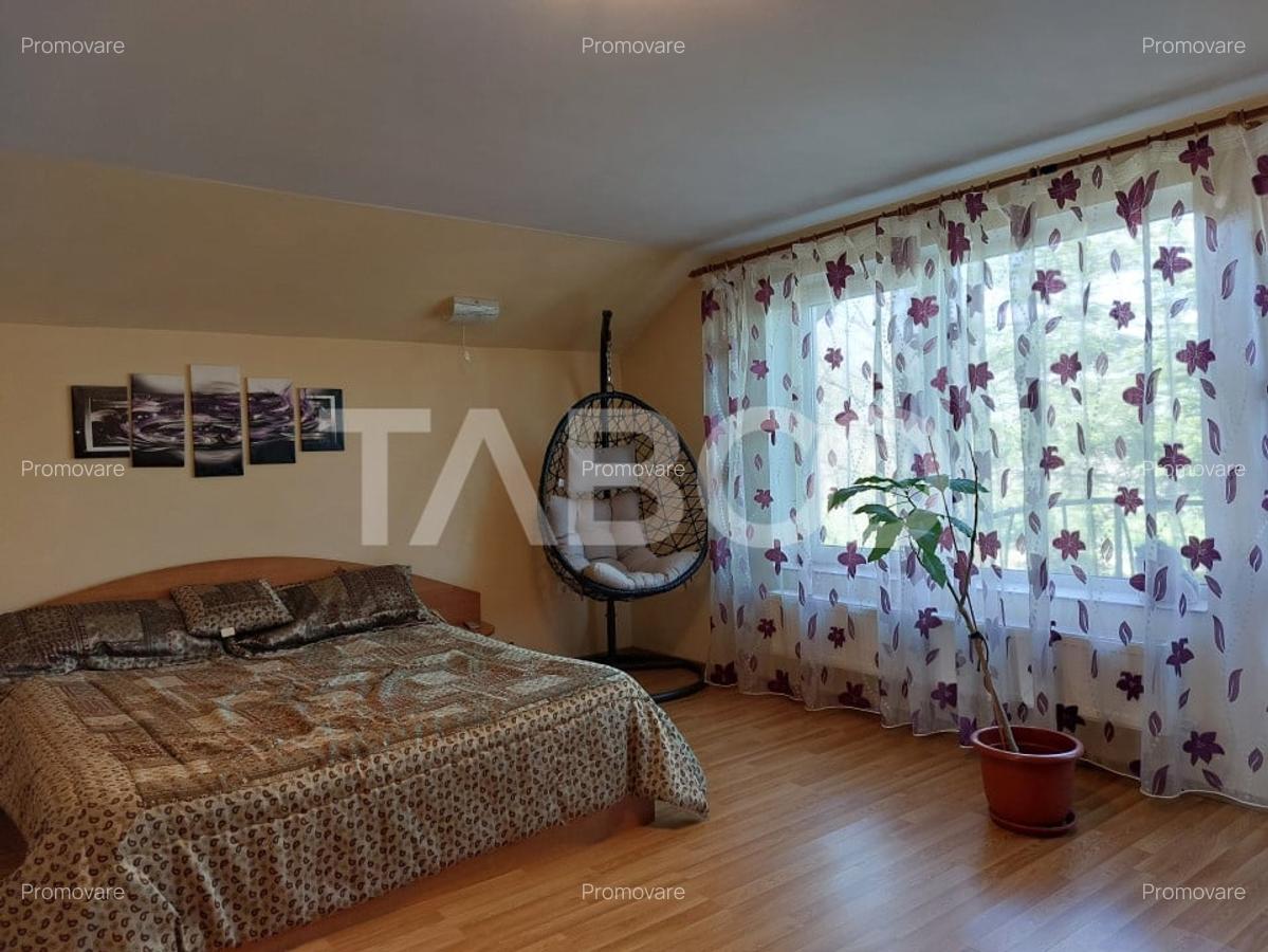 Casa individuala 4 dormitoare curte gradina zona retrasa in Cisnadie - 12