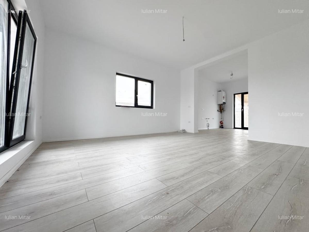 Casa individuala 4 camere,648mp teren,93mp utili, asfalt -Mosnita Noua - 2