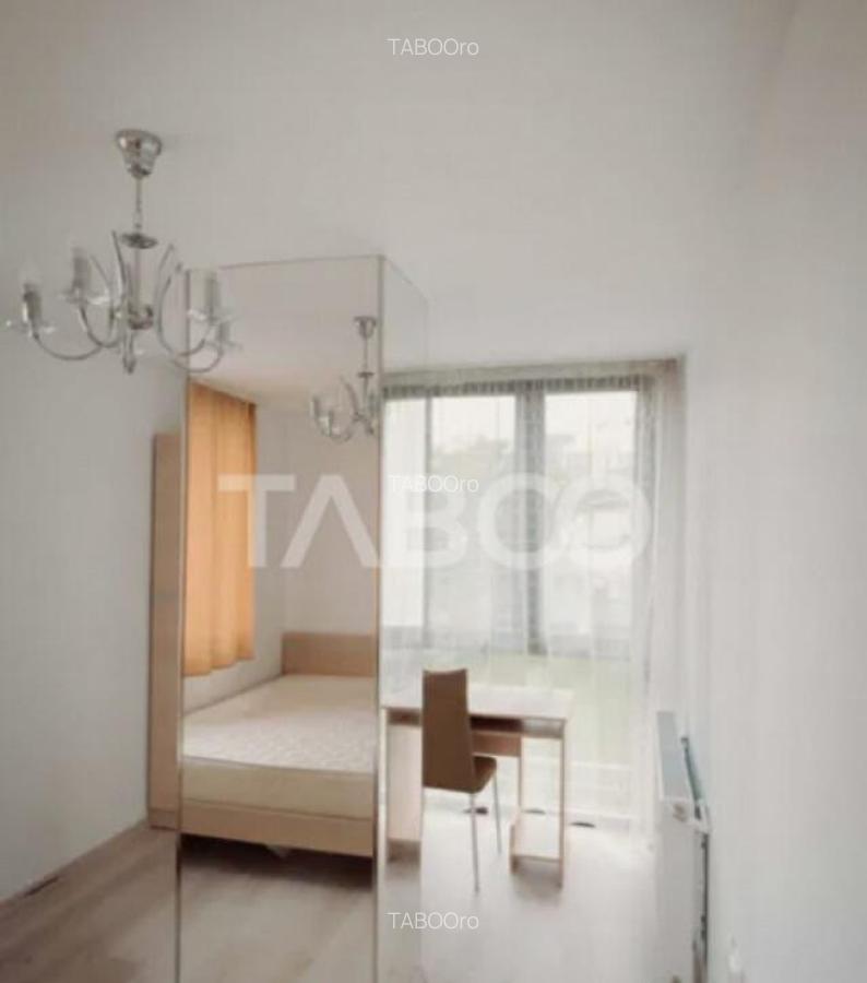 Apartament de vanzare decomandat cu 2 camere situat in Maras - 2