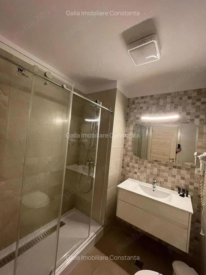 Studio-de inchiriat- 330E luna negociabil - 3 Studio-de inchiriat- 330E luna negociabil - 3