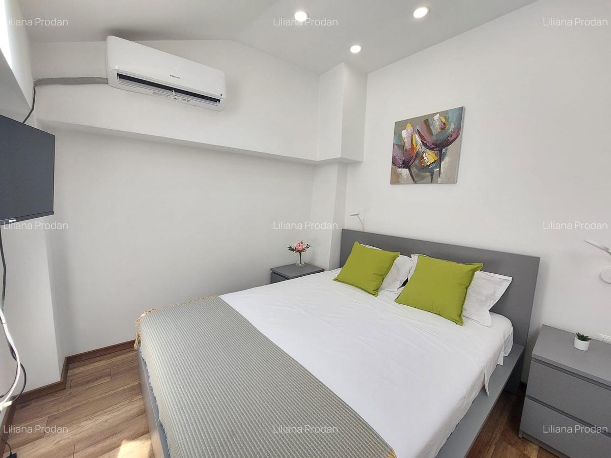 Apartament cu 2 camere decomandat, mobilat în P-ța Universității - 11