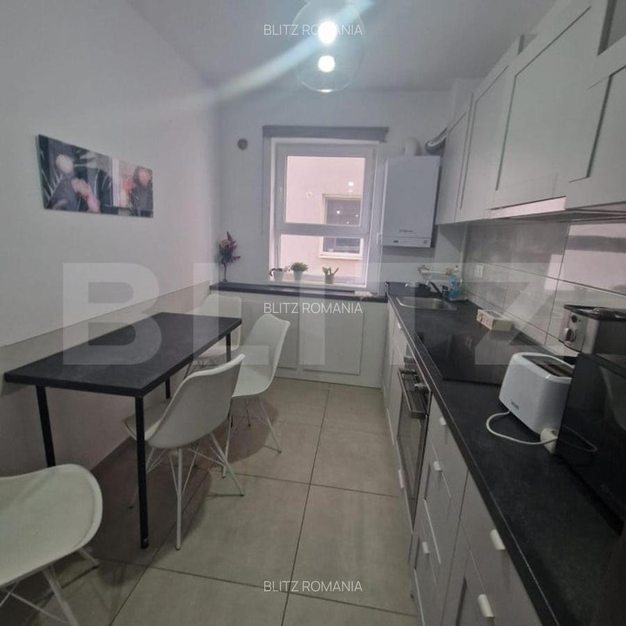 Apartament cu 3 camere, 76 mp, decomandat, loc de parcare - Tractorul - 2