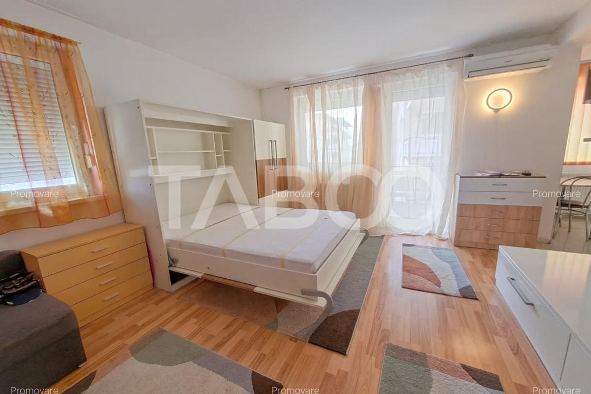 Garsoniera decomandata de vanzare cu lift si pivnita Colinei Sibiu - 3 Garsoniera decomandata de vanzare cu lift si pivnita Colinei Sibiu - 3