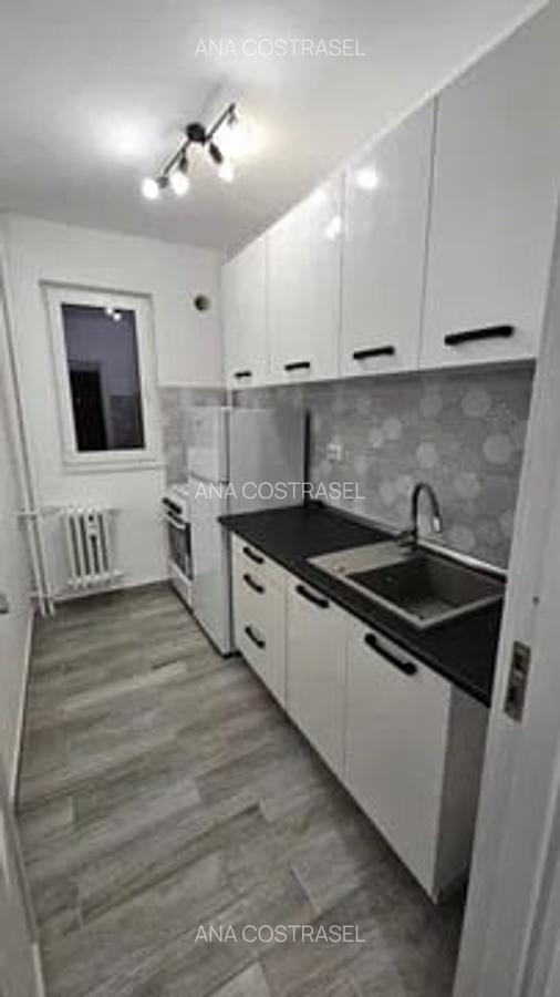 Apartament cu 2 camere, decomandat, etajul 6/10, zona Podu Ros - 4