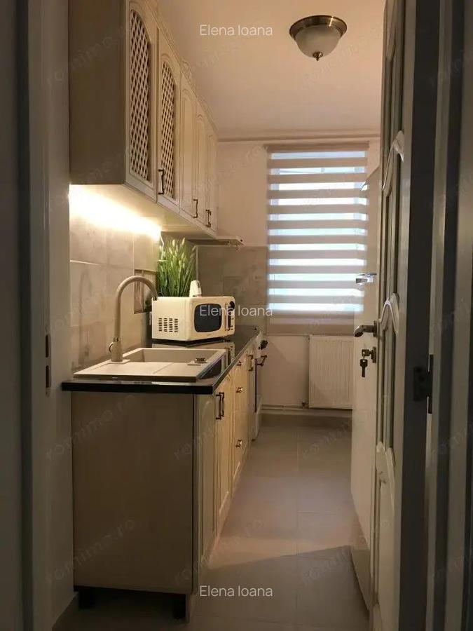 Propun spre inchiriere apartament cu trei camere in zona Cotroceni - 5