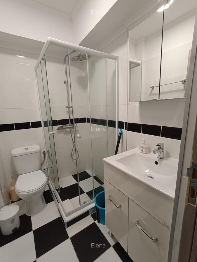 Magheru 2 camere renovat complet si mobilat - 11